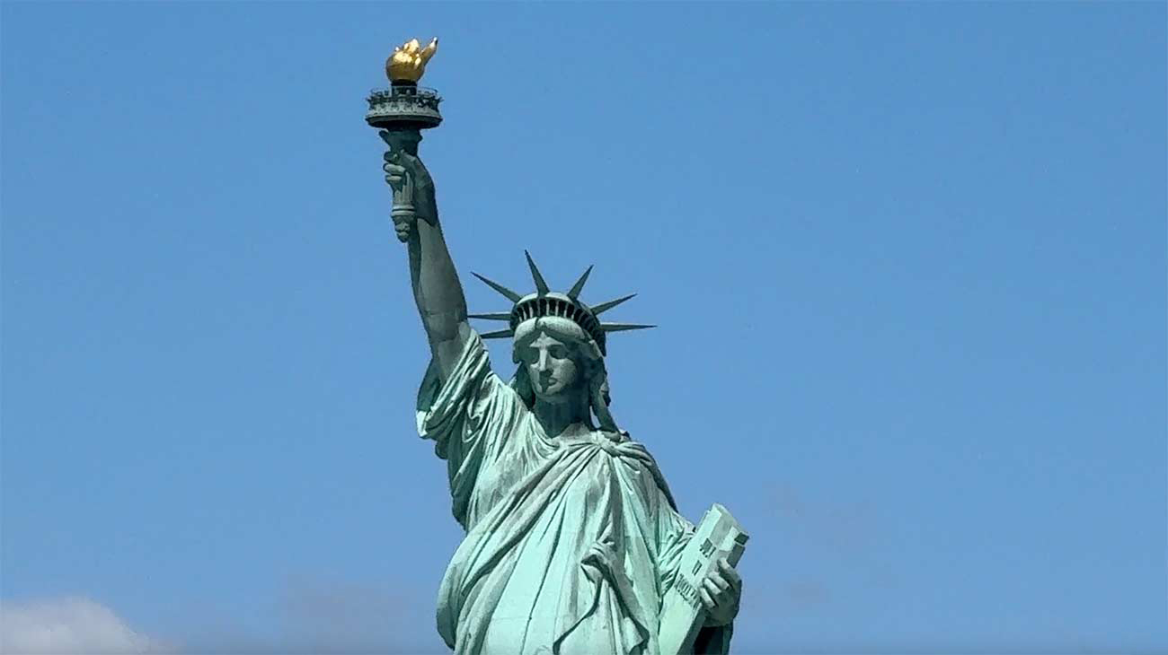 Guests viewing the Statue of Liberty from New York Harbor