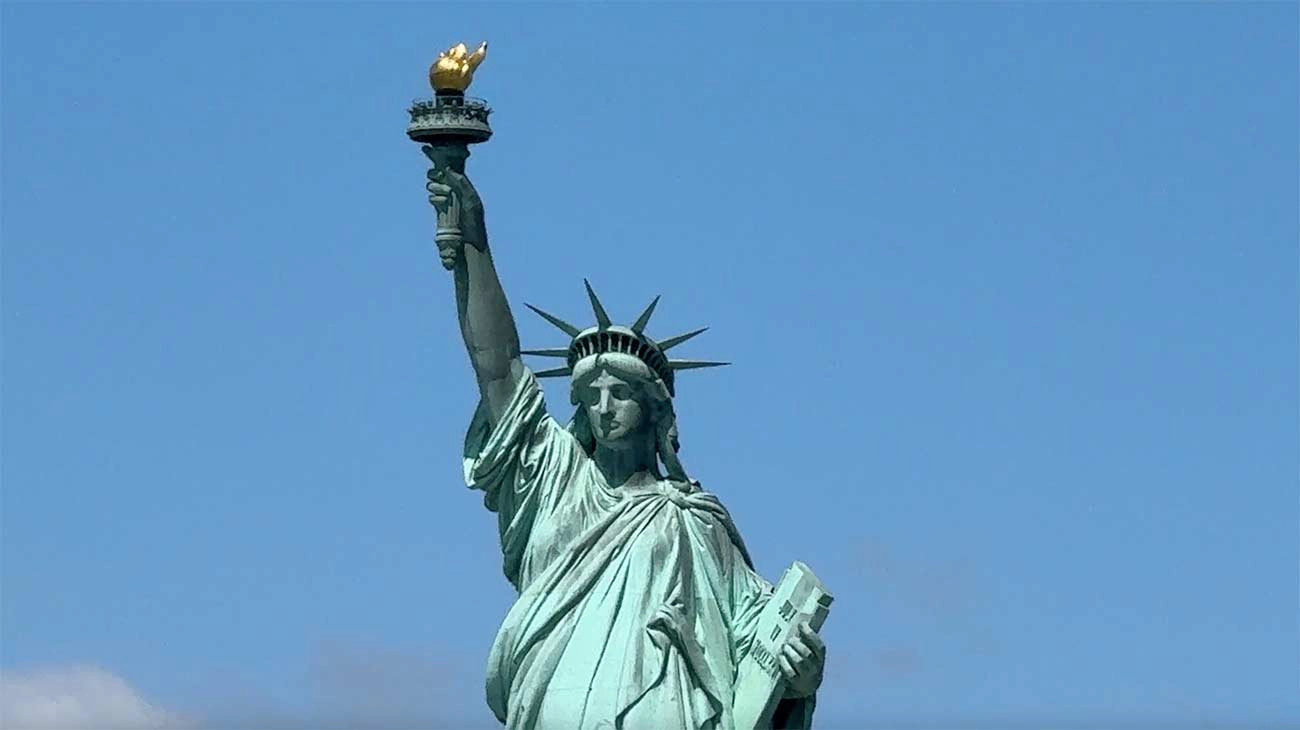 Guests viewing the Statue of Liberty from New York Harbor